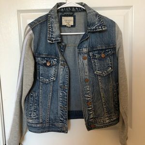 Jean jacket with sweater sleeves